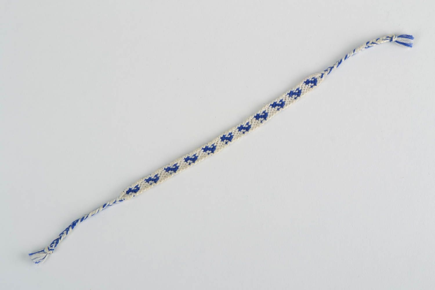 Handmade thin white and blue friendship wrist bracelet woven of threads with tie photo 5