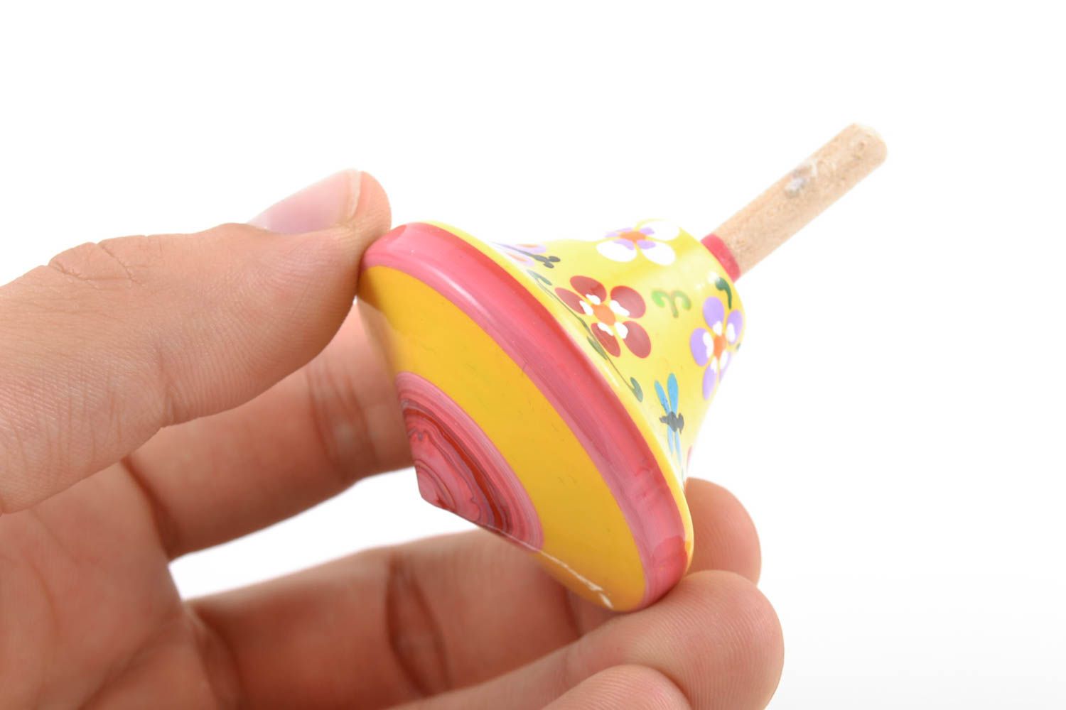 Bright children's handmade wooden spinning top toy painted with eco dyes photo 2