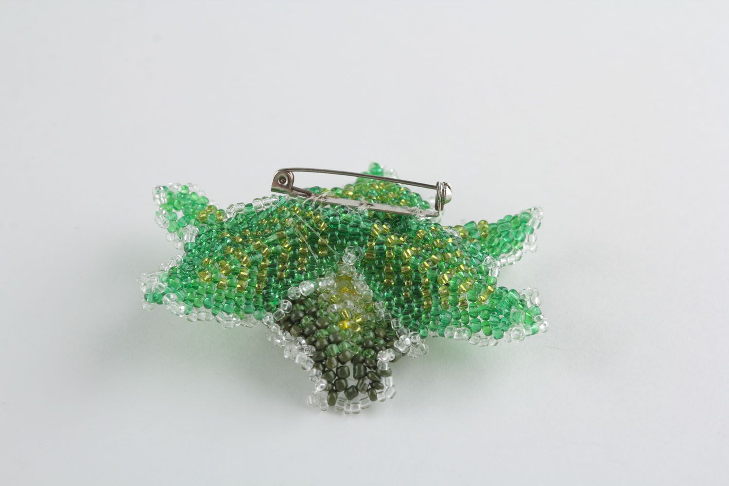Grüne Brosche aus Glasperlen Blume foto 1