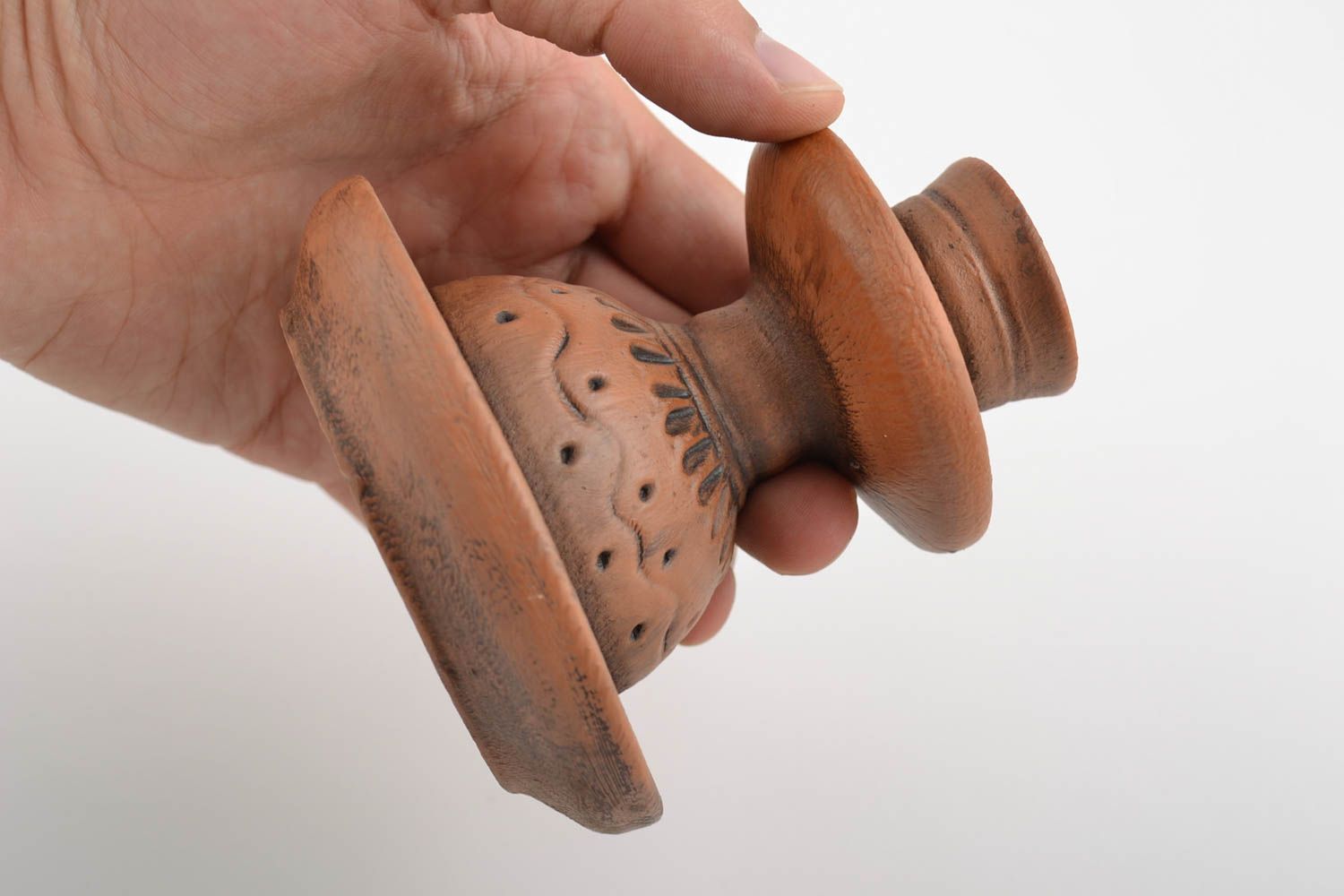 Handmade designer brown clay candlestick with patterns for one thin candle photo 3