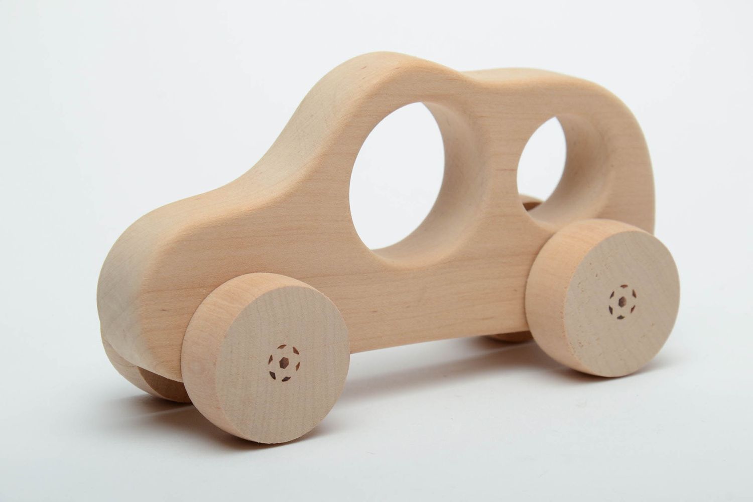 Wooden wheeled toy car photo 2