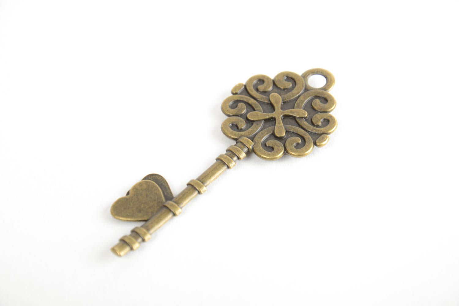 Handmade designer botanical pendant on metal basis coated with epoxy Key photo 2