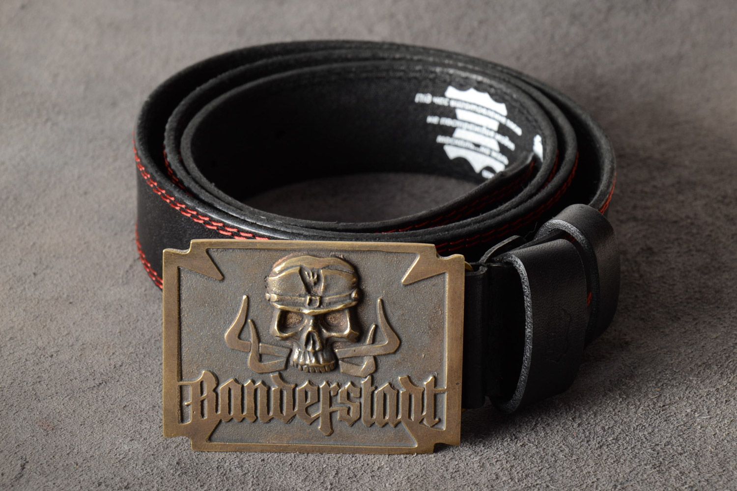 Homemade genuine leather belt with metal buckle and embossment in the shape of skull photo 1