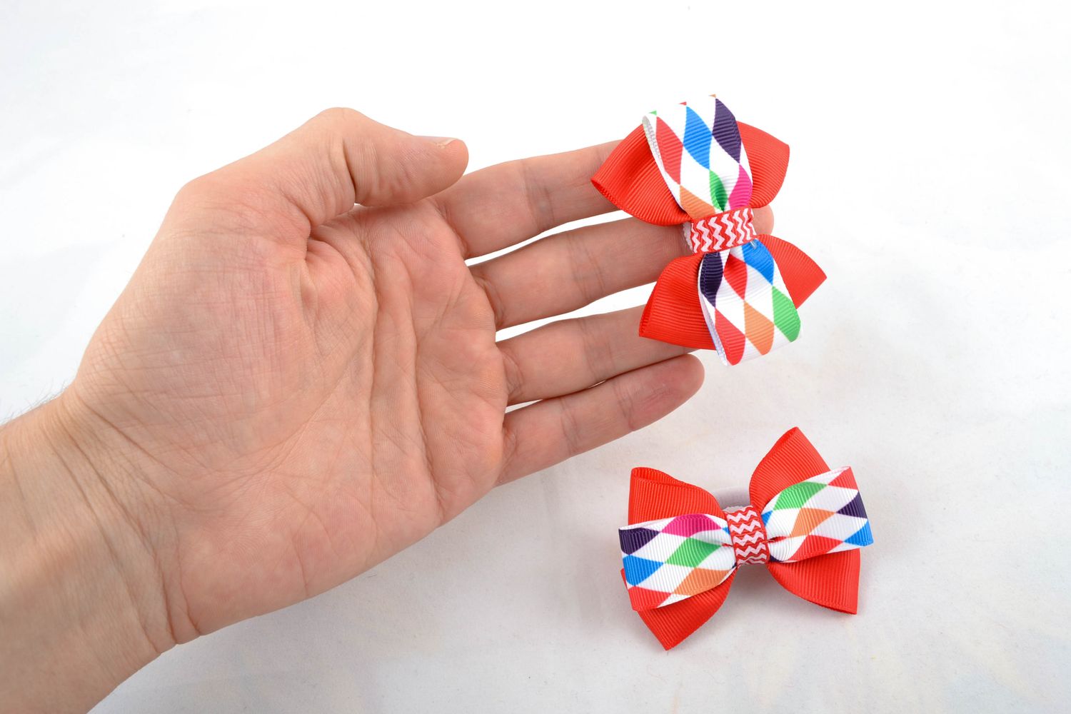 Hair ties with bows made of rep ribbons of red color photo 2