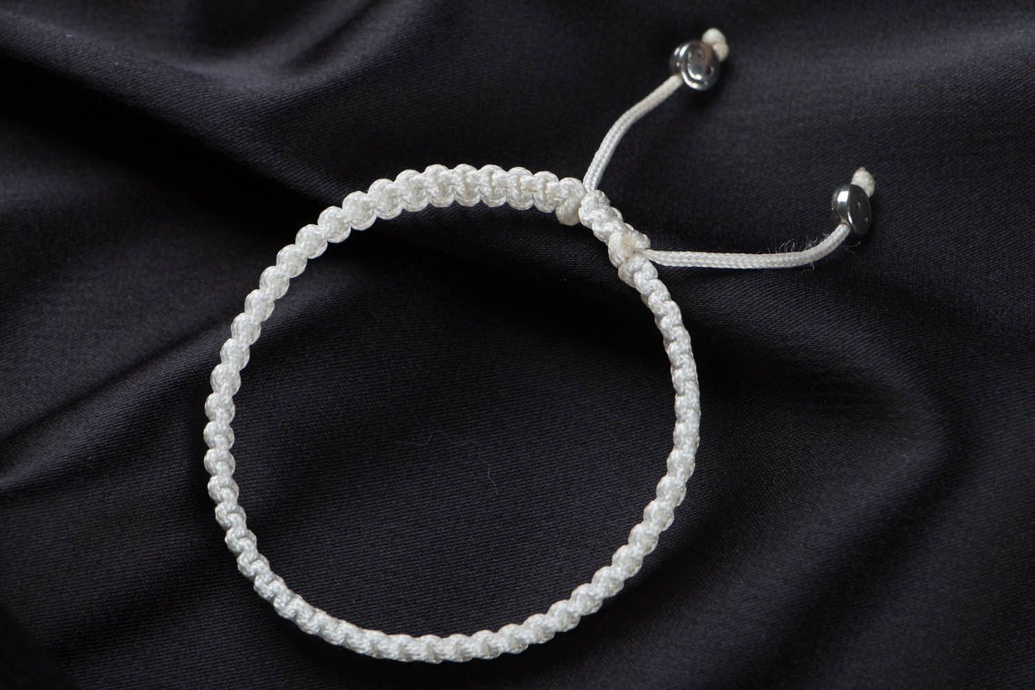 White braided bracelet photo 1