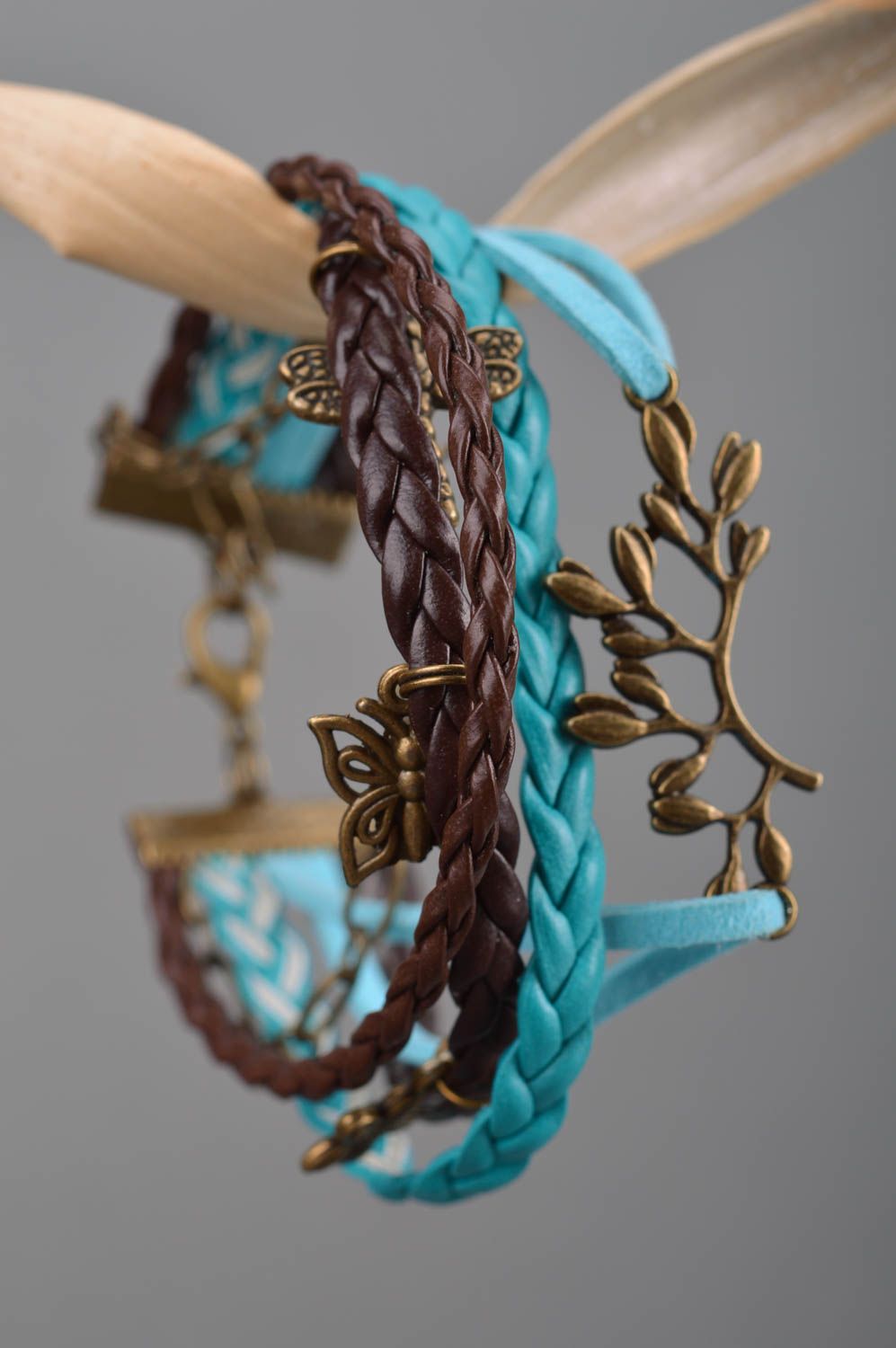 Handmade multi row brown and turquoise suede cord wrist bracelet with charms photo 3
