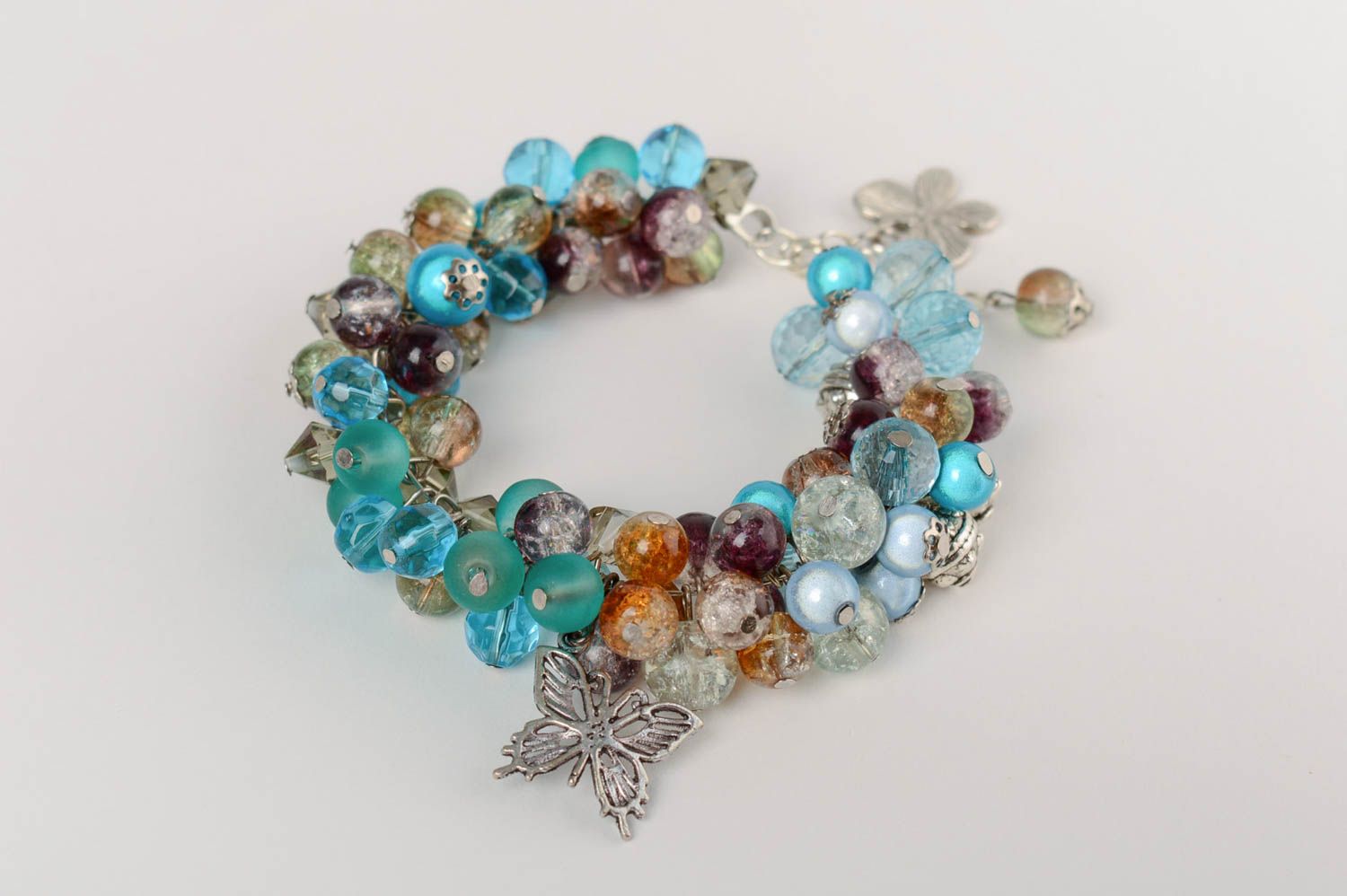 Handmade festive beautiful bracelet made of crystal and glass with charms photo 4