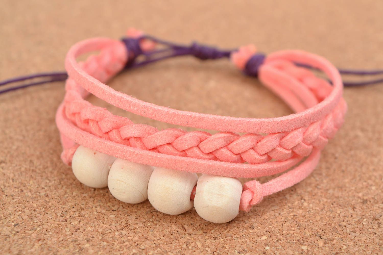 Handmade multi row pink suede cord woven wrist bracelet with wooden beads  photo 1