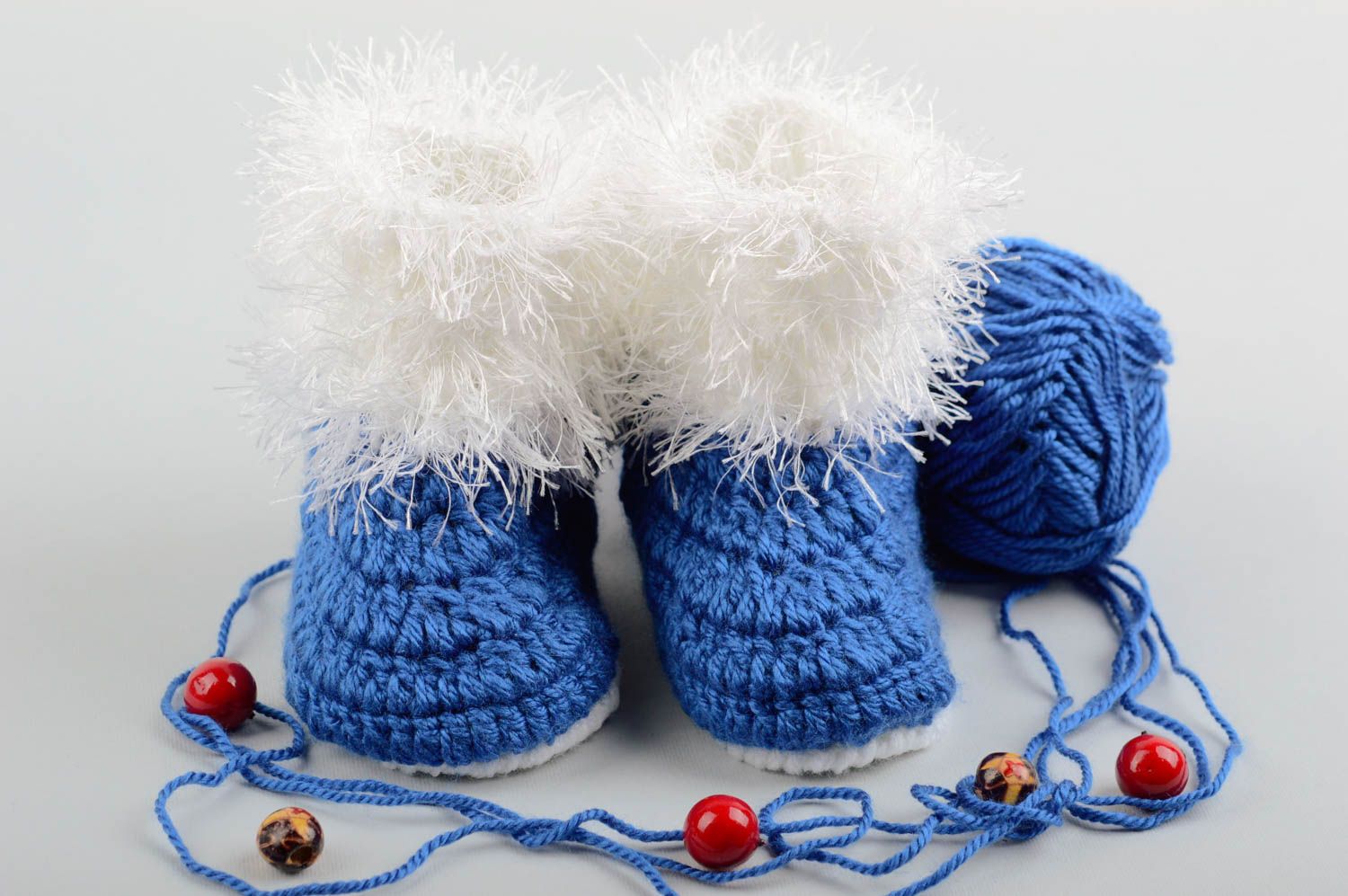 Chaussons bébé faits main Pantoufles tricot bleues Accessoire bébé design photo 1