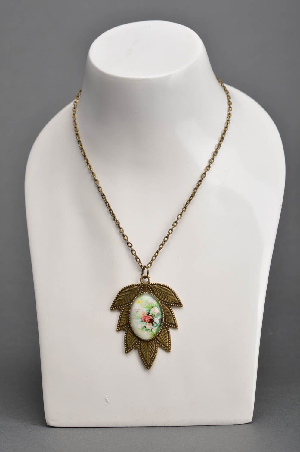 Beautiful vintage handmade leaf shaped metal pendant with cabochon and chain photo 1