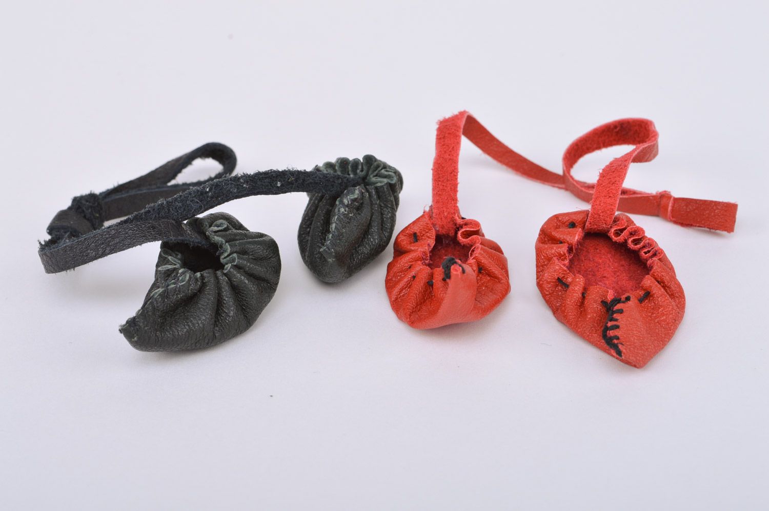 Set of handmade leather keychains 2 items bag charms black and red bast shoes with cords photo 2