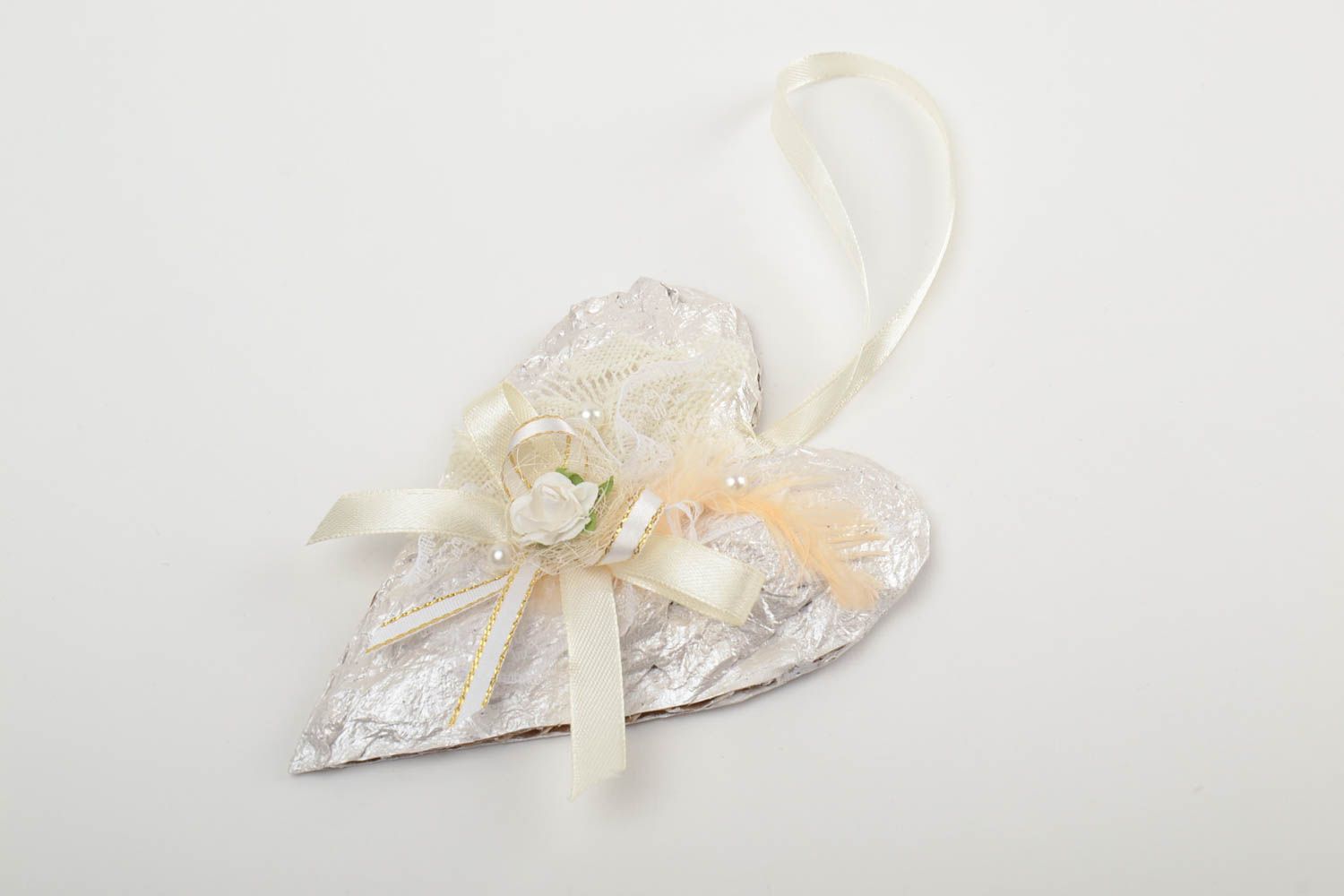 Handmade white heart-shaped carton wall hanging decorated with ribbons  photo 2