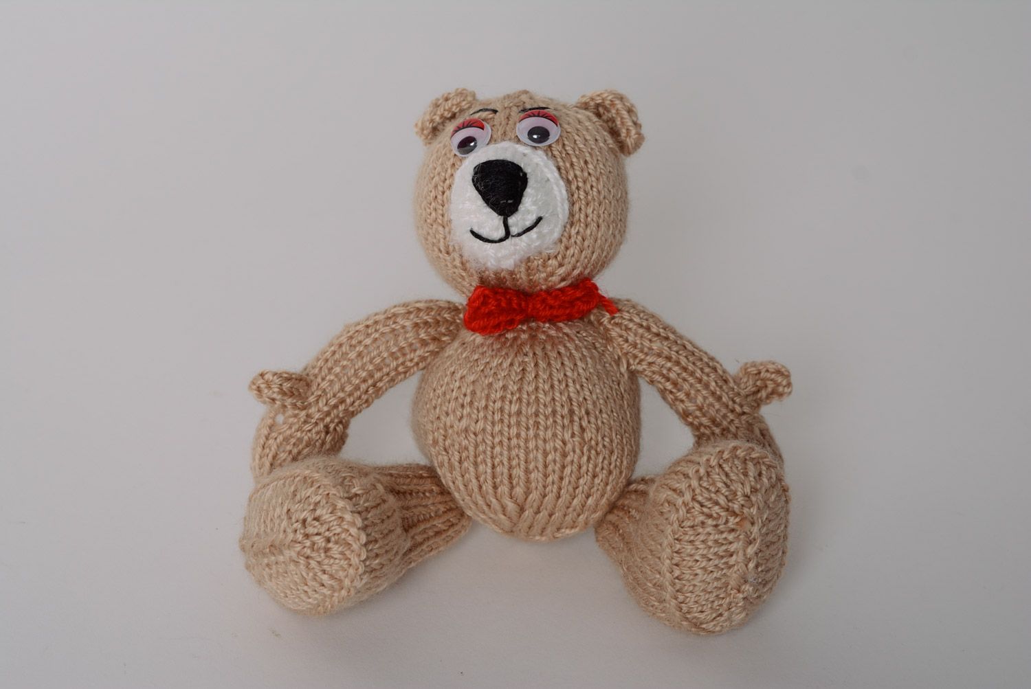Nice homemade knit soft toy bear of beige color with bow photo 5