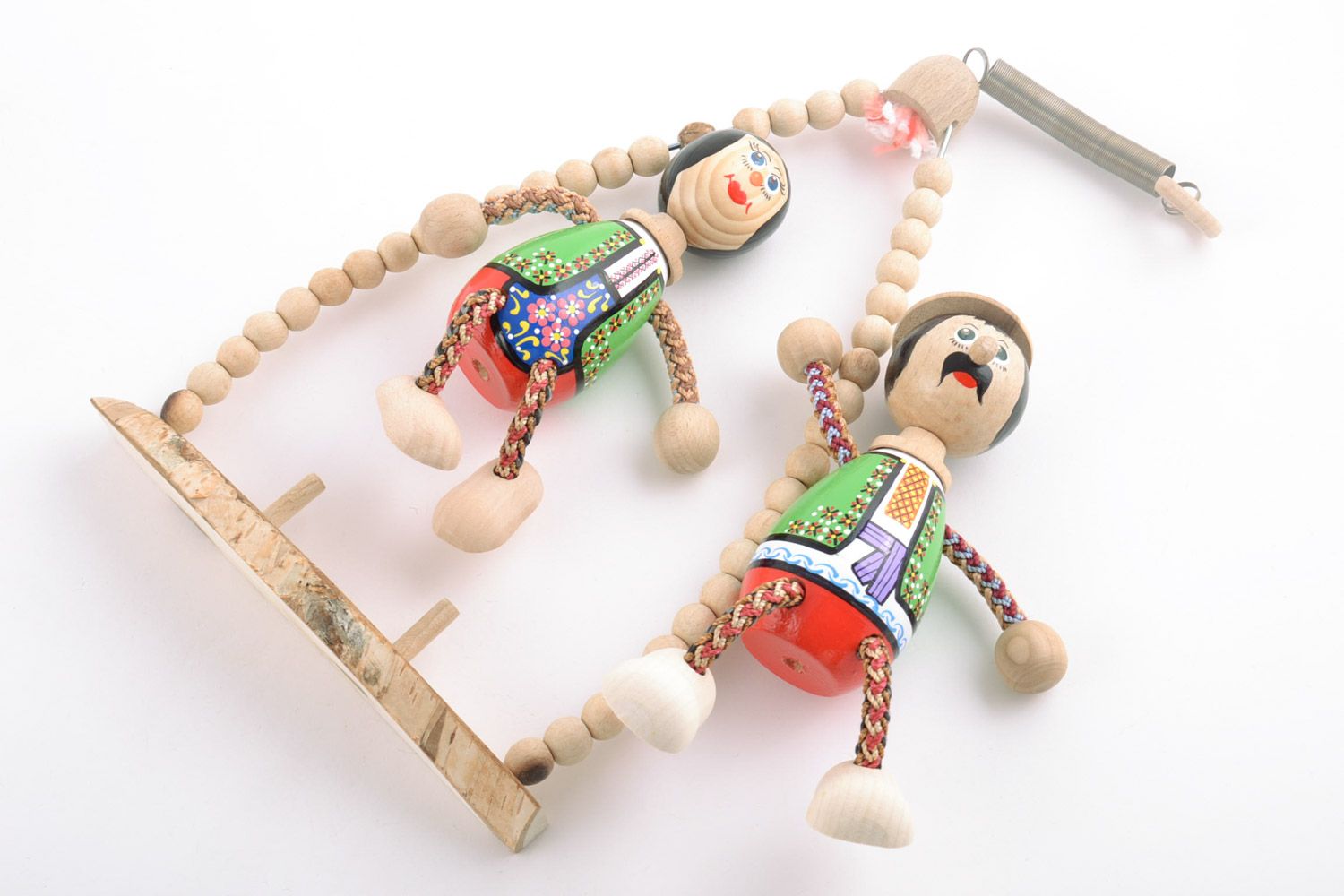Children's handmade wooden toy with spring painted with eco dyes photo 5
