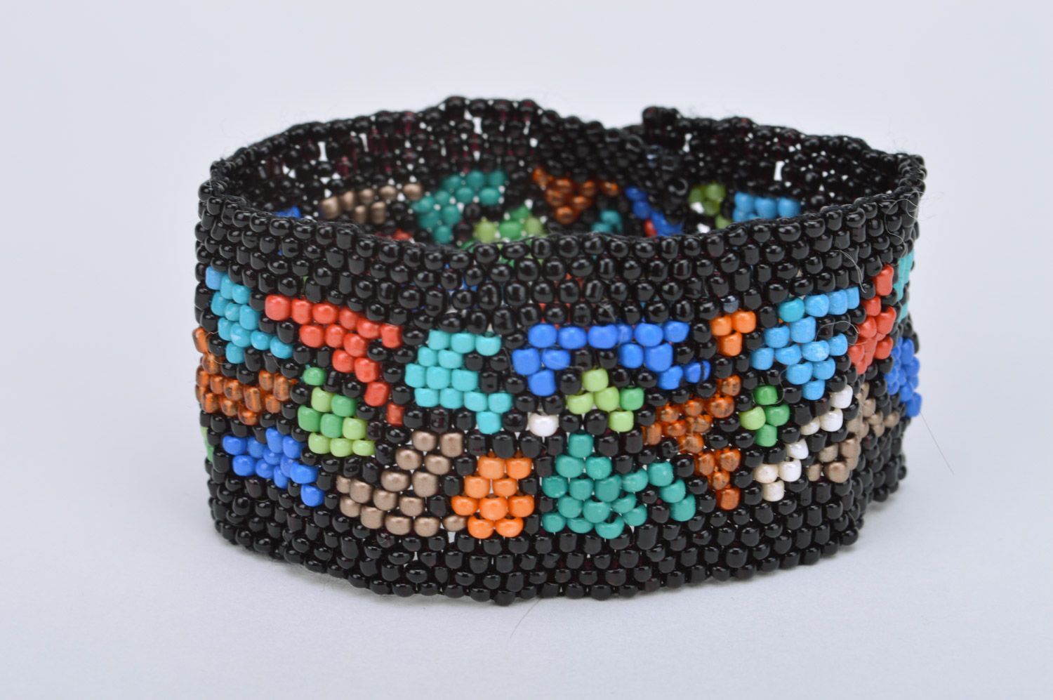Handmade broad wrist bracelet woven of black and colorful beads for women  photo 2