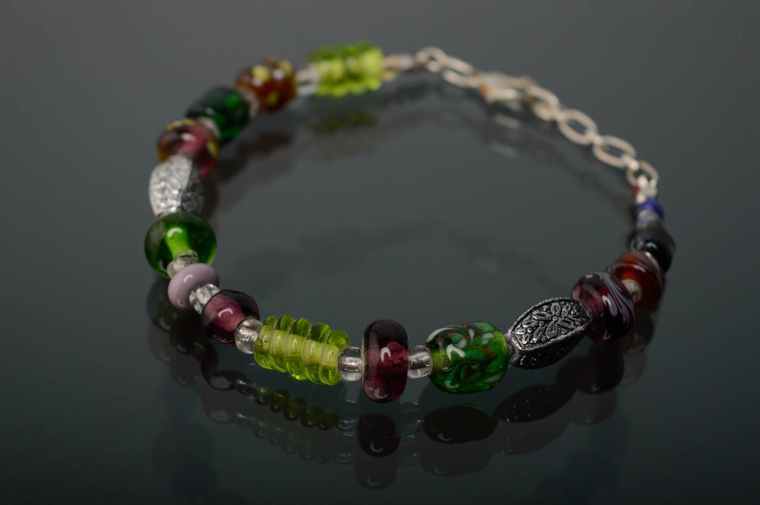 Bracelet with designer lampwork glass beads with patterns photo 1