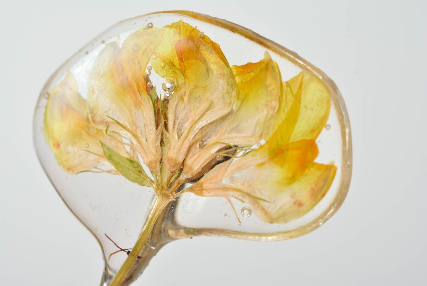 Handmade decorative metal hair pin with yellow dried flower in epoxy resin photo 4