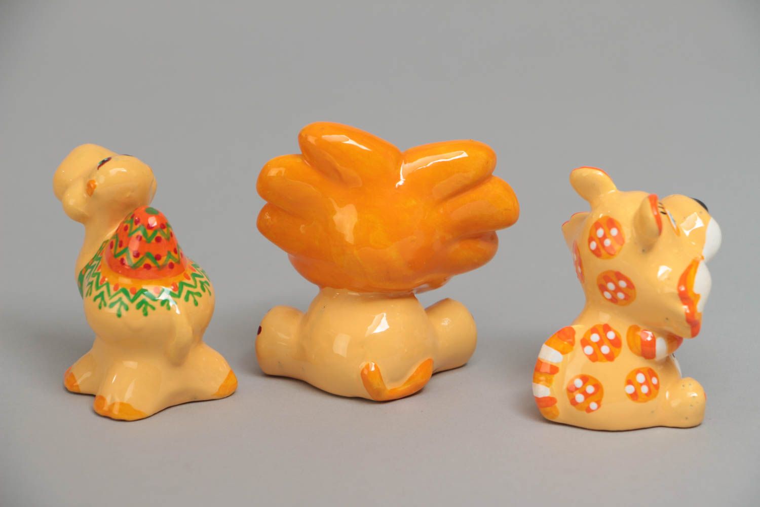 Figures of animals set of bright colored statuettes plaster lion camel cat photo 3