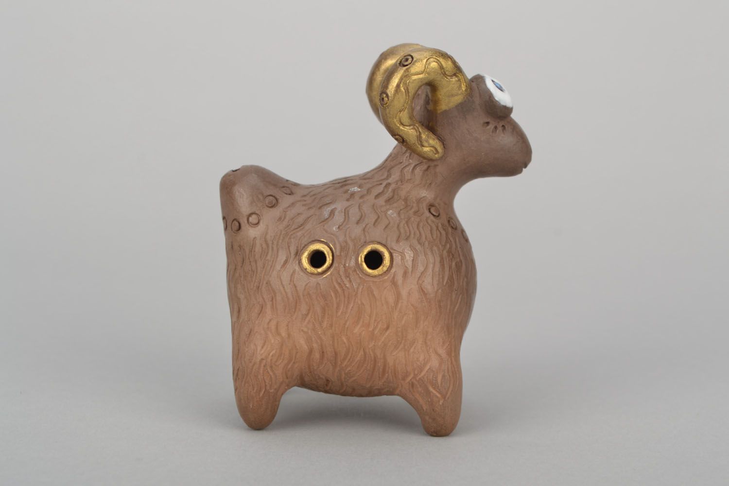 Clay penny whistle in the shape of ram photo 6