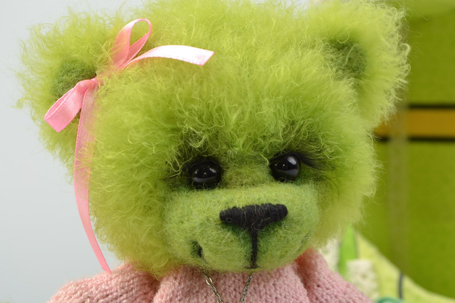 Handmade collectible crocheted soft toy bear in a box of light green color photo 4