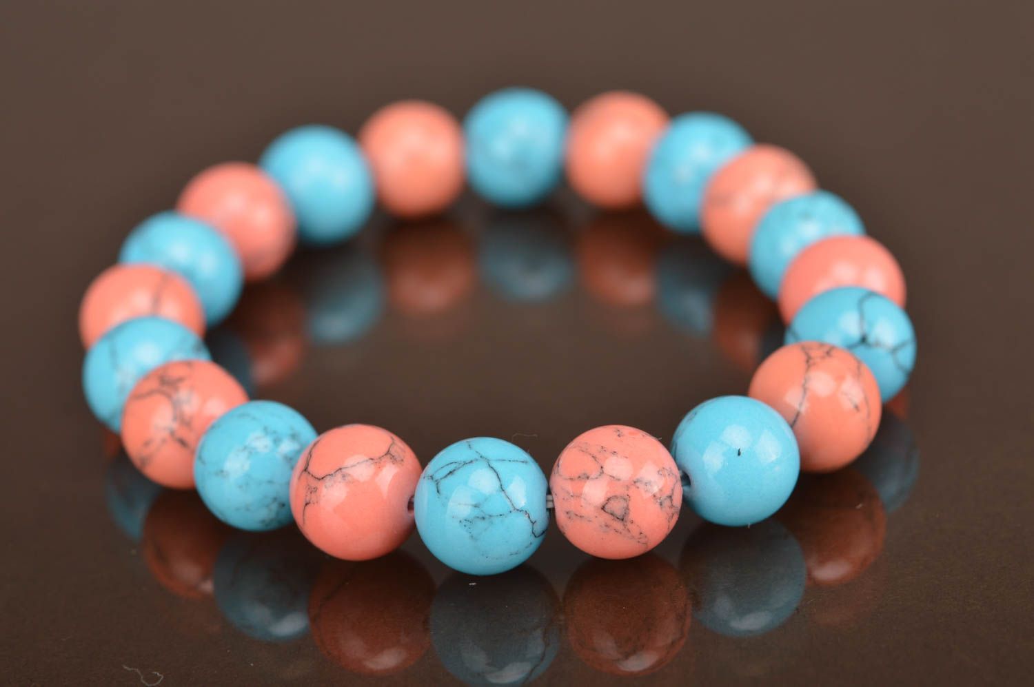 Handmade pink and blue accessory simple bracelet made of beads on elastic band photo 3