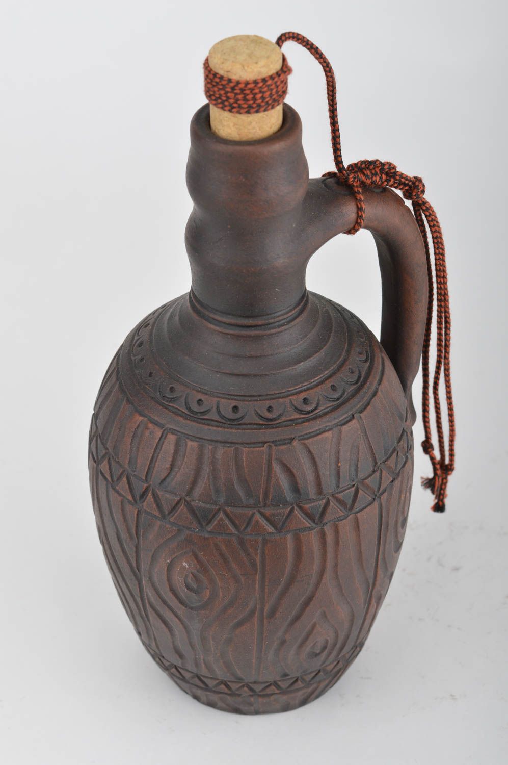 Bouteille en argile faite main décorative avec bouchon et anse brune à motif photo 5
