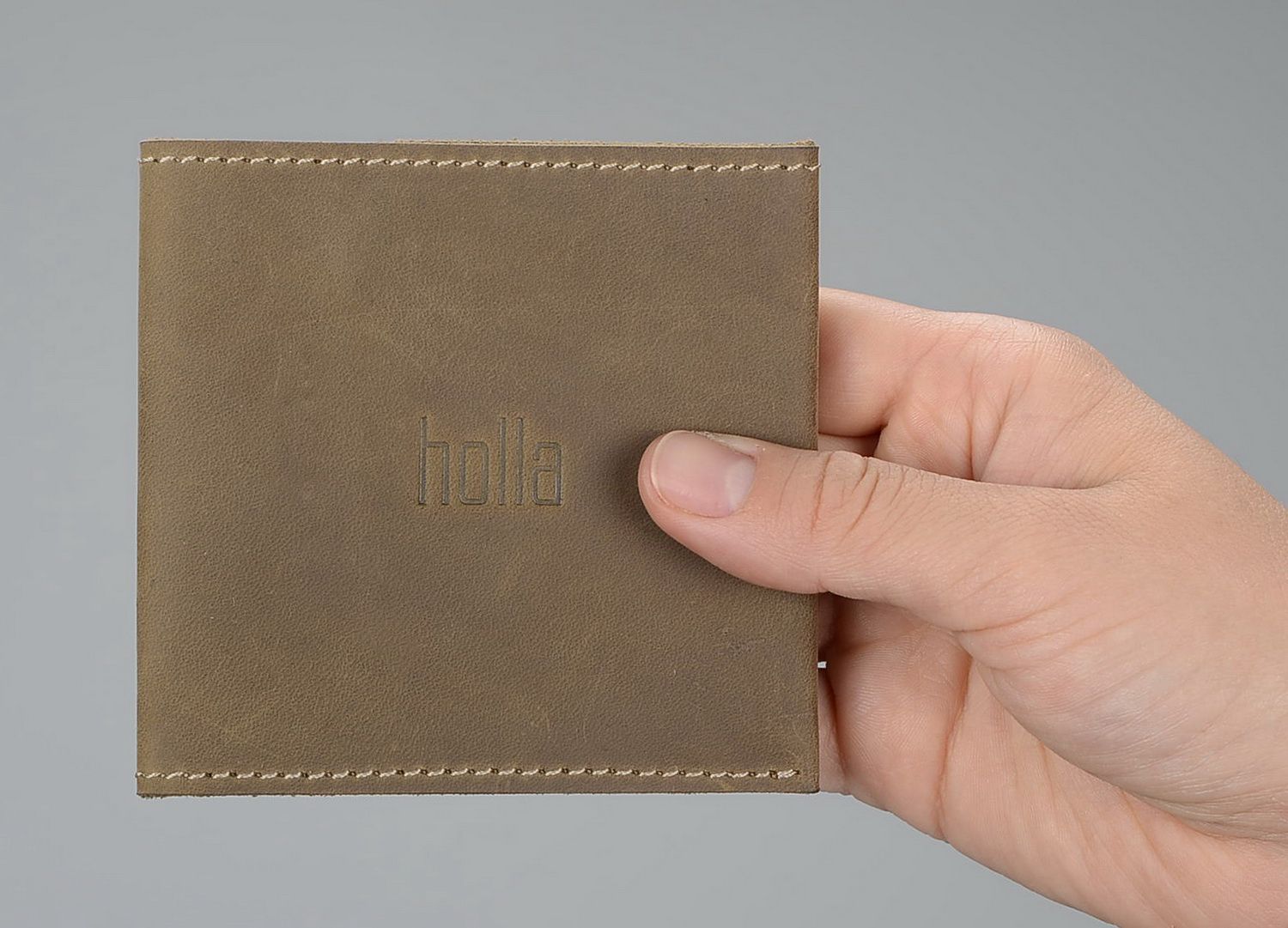 Wallet made from natural beige leather photo 1