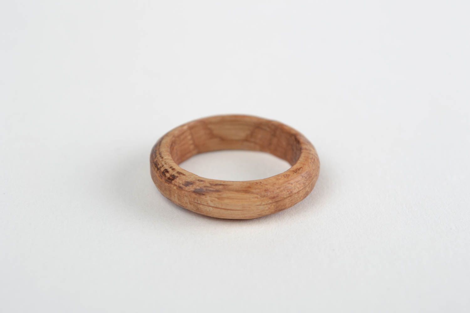 Simple handmade jewelry ring carved of natural oak wood of laconic design photo 3
