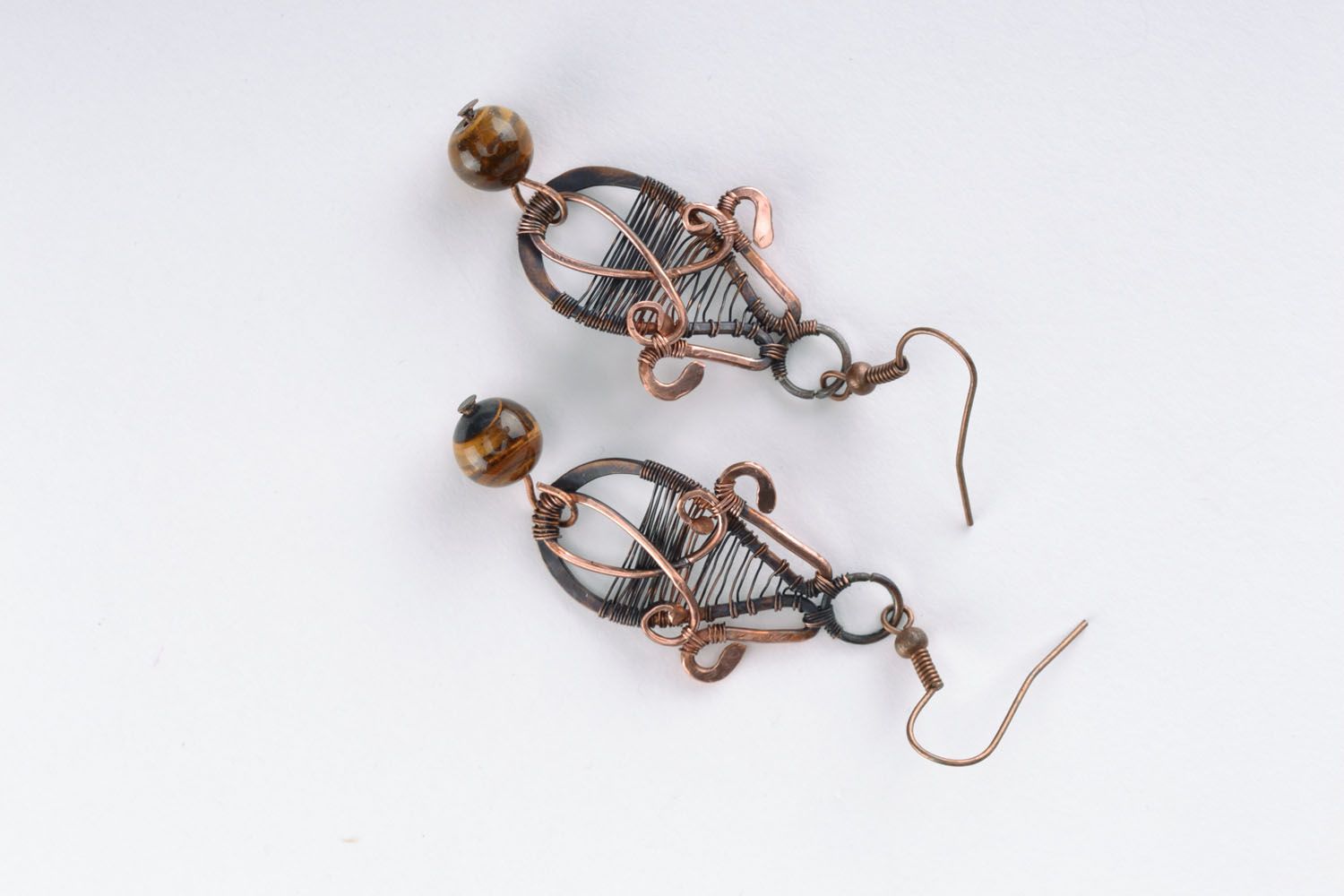 Copper earrings with tiger eye stone photo 1