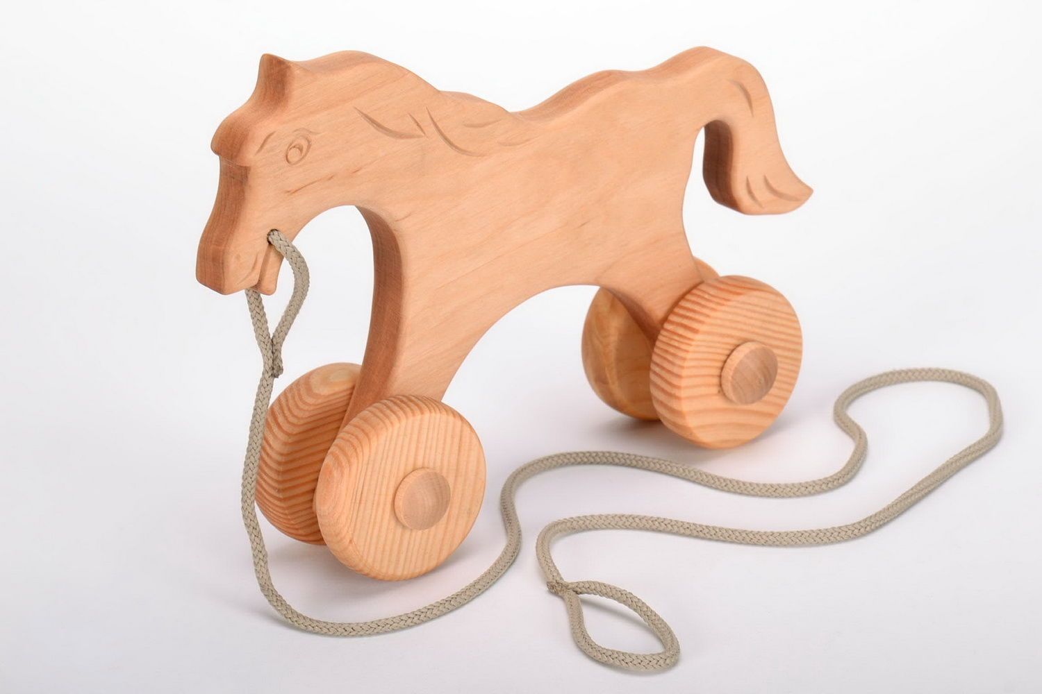 Children's toy horse on wheels  photo 1