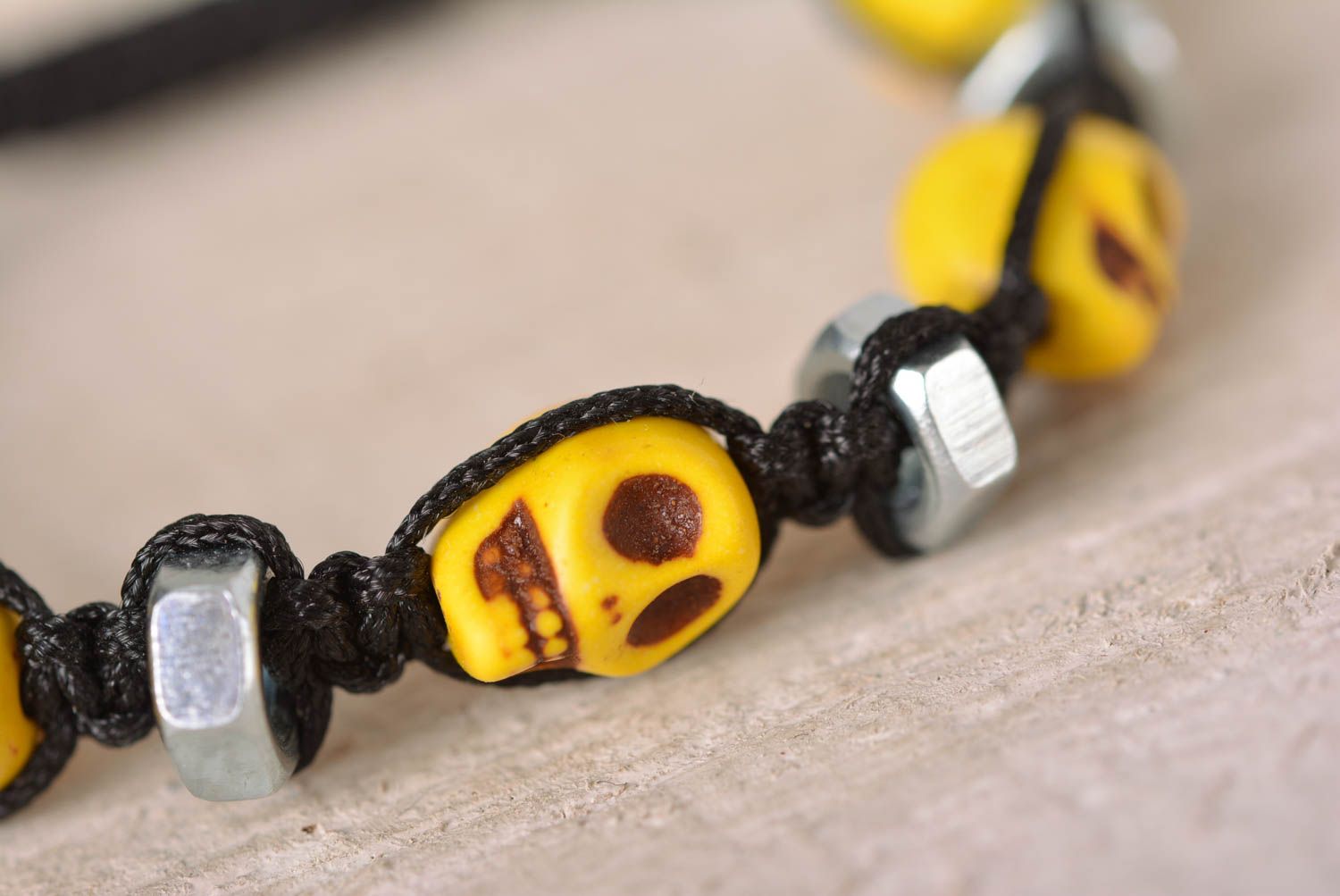 Handmade yellow skull beaded black cord bracelet with female screws photo 2