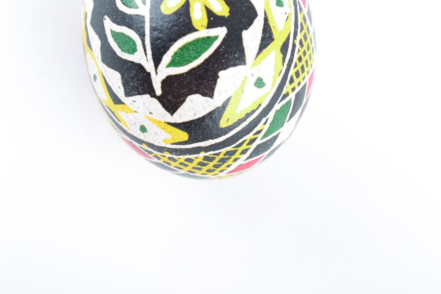 Homemade painted chicken egg with flower pattern for Easter photo 4