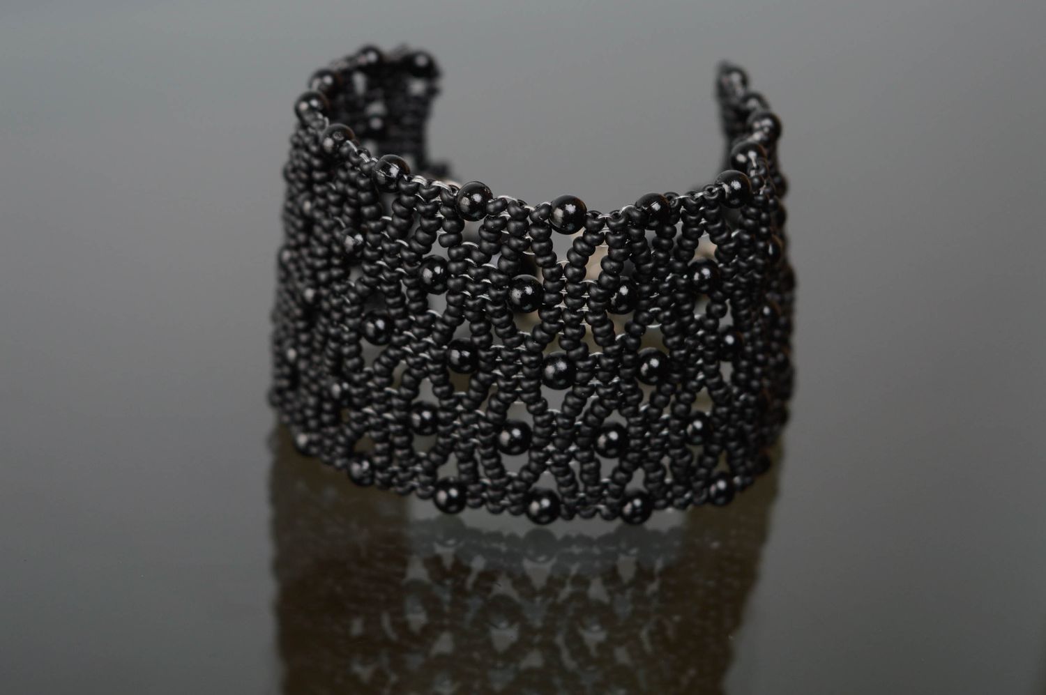 Wide lacy beaded bracelet of black color photo 2