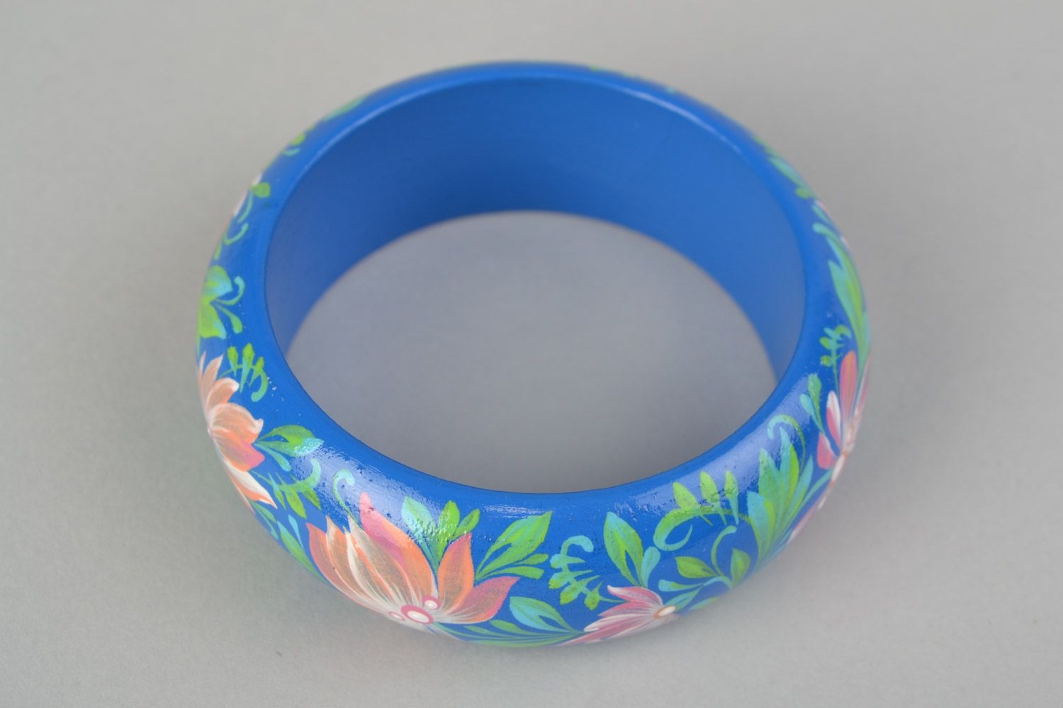 One-piece handmade wooden bracelet with Petrikov painting blue with flowers photo 5