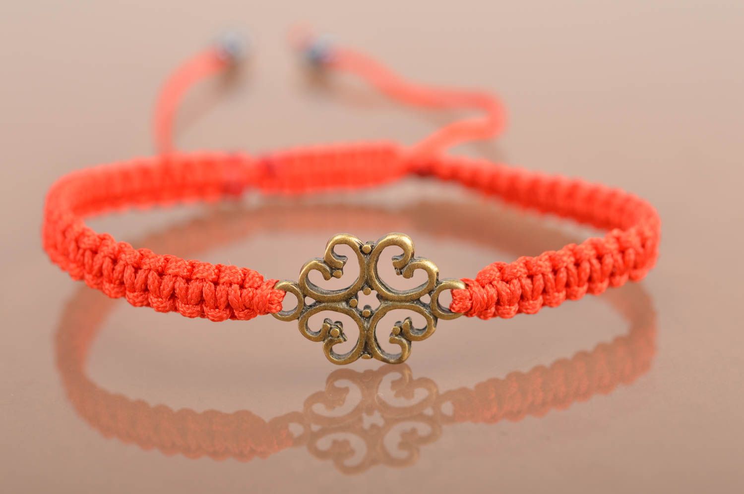 Beautiful handmade designer woven silk friendship bracelet with metal insert photo 2