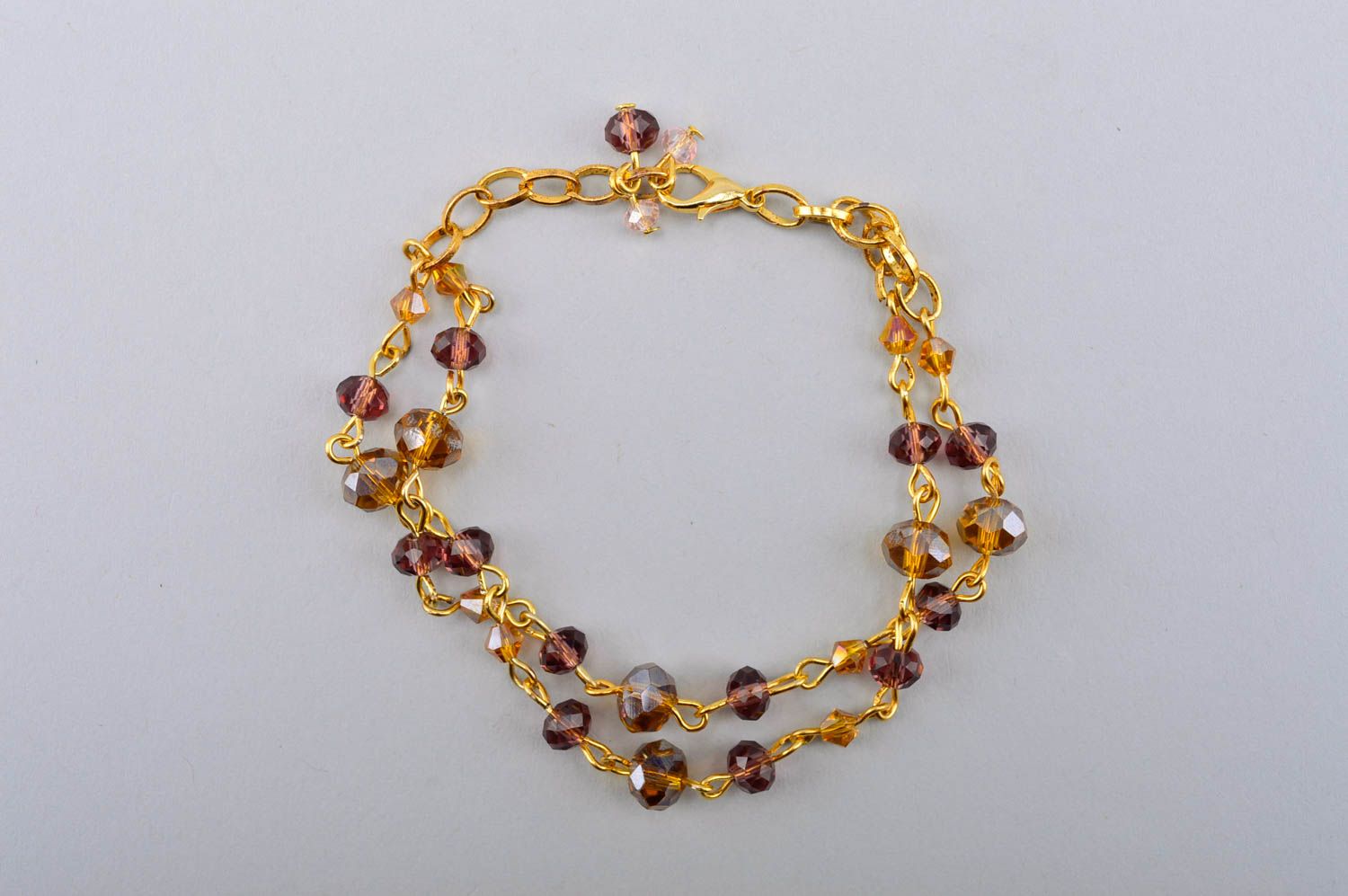Golden color two layers chain bracelet with golden color beads photo 2