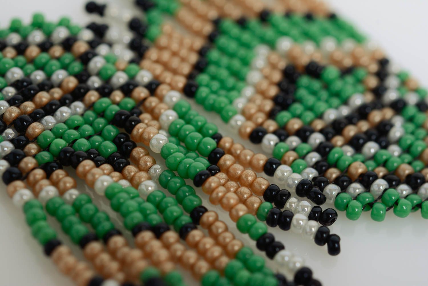 Beige green and black handmade designer beaded earrings with fringe photo 4