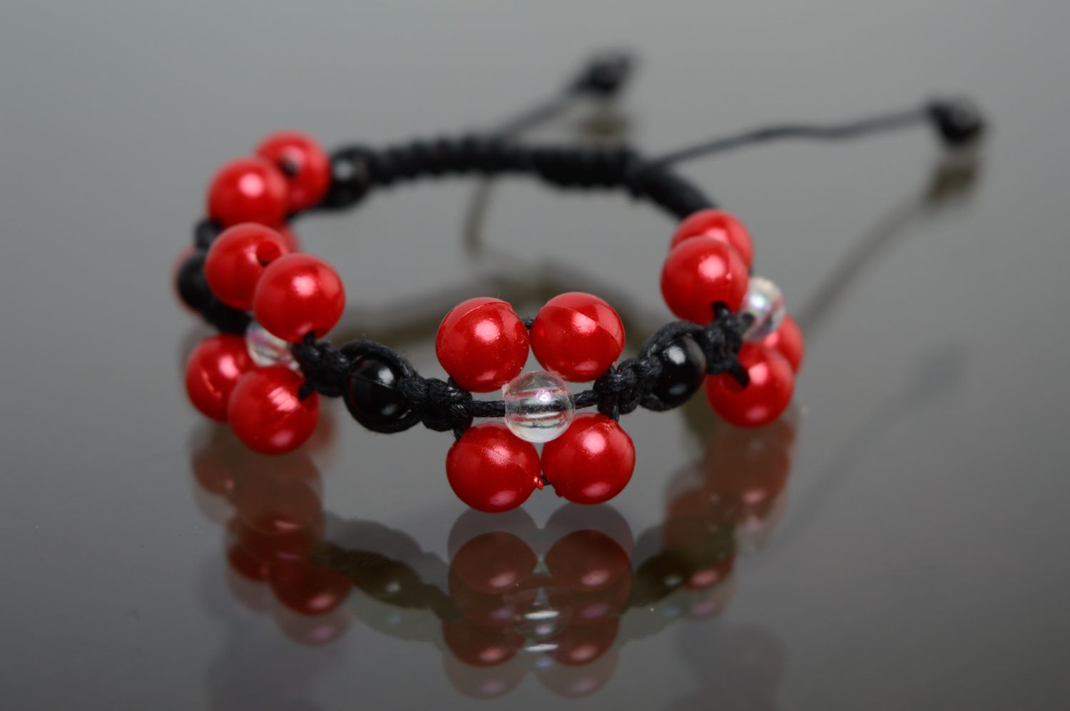 Black and red macrame bracelet with ceramic beads photo 1