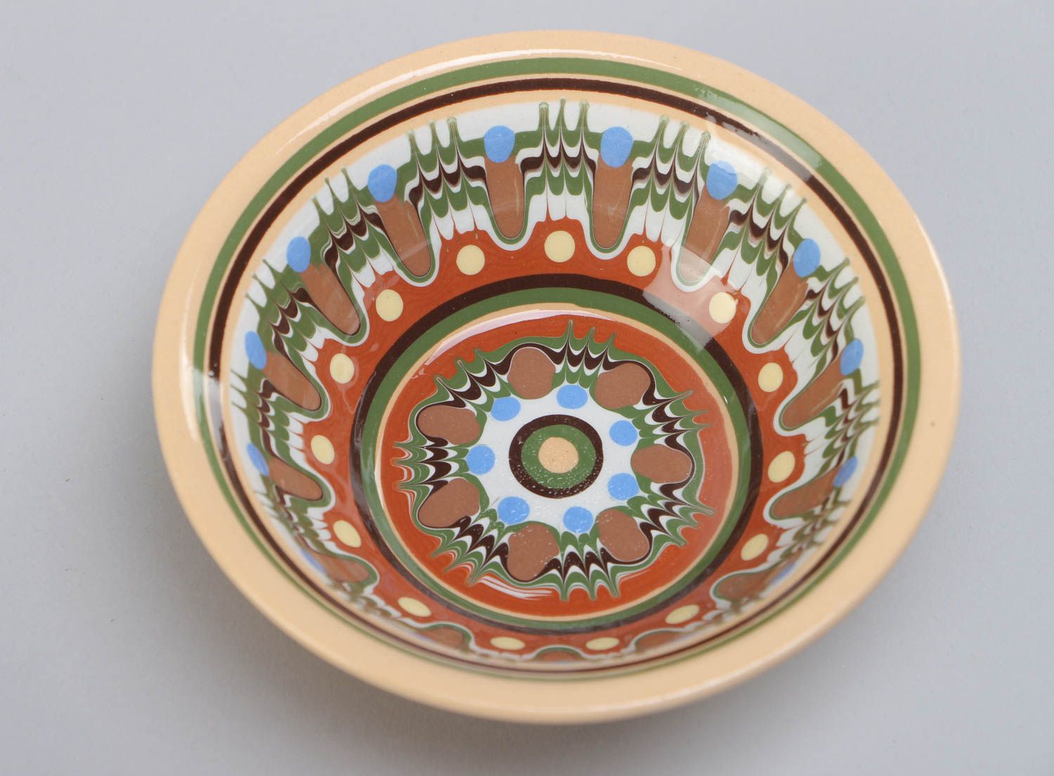 Deep ceramic bowl decorated with ornaments painted with glaze handmade 200 ml photo 3