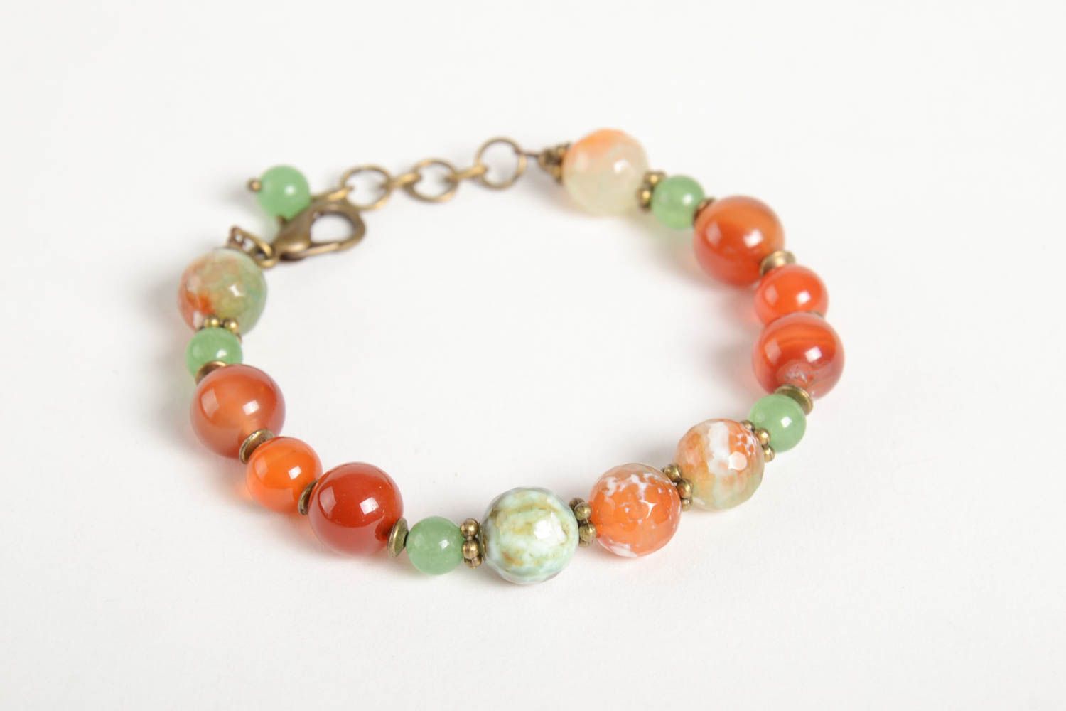 Stylish handmade gemstone beaded adjustable bracelet in pale green and orange color photo 5