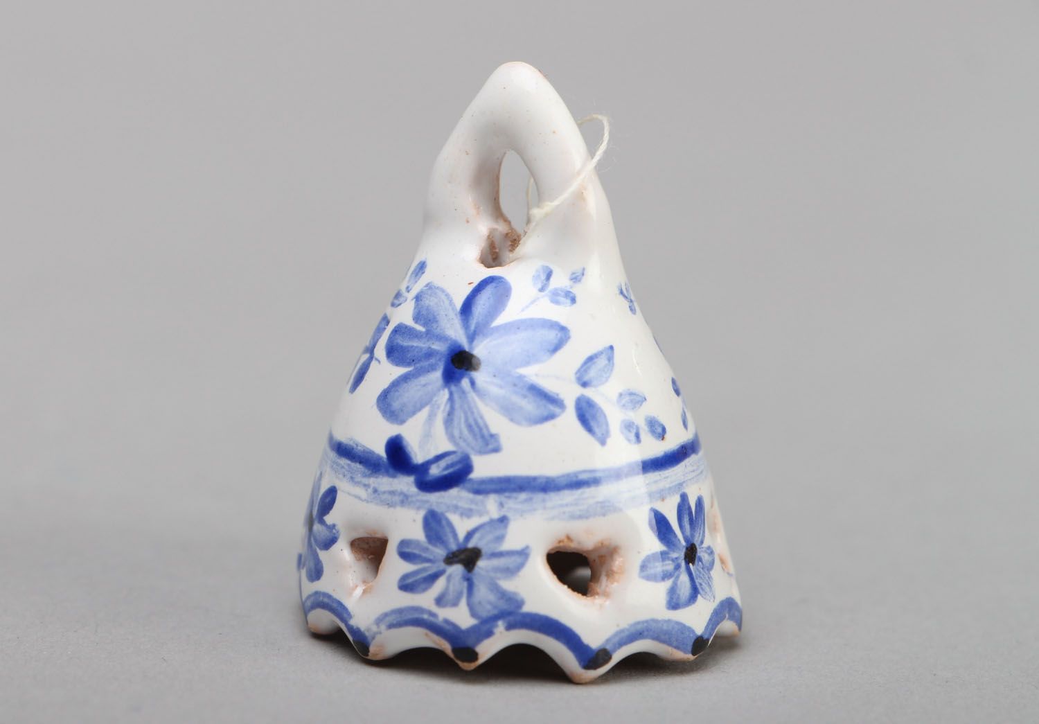 Small painted clay bell photo 1