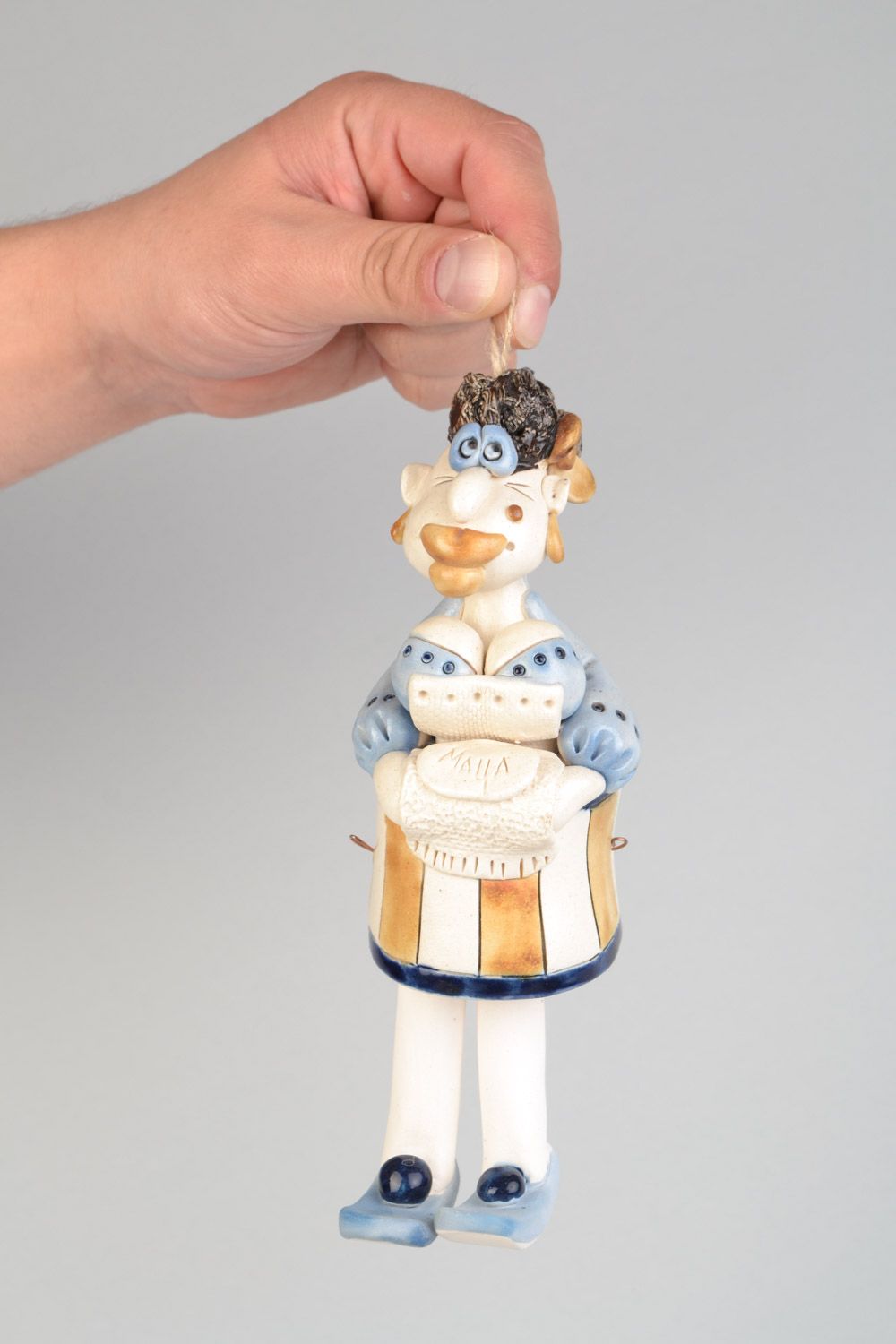 Campanilla cerámica hecha a mano con forma de mujer con ojal decoración foto 1