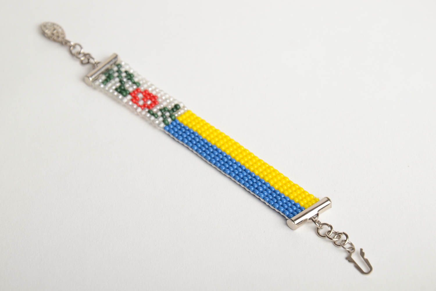 Бисерный браслет тонкий ручной работы на цепочке желто-голубой с цветами фото 5