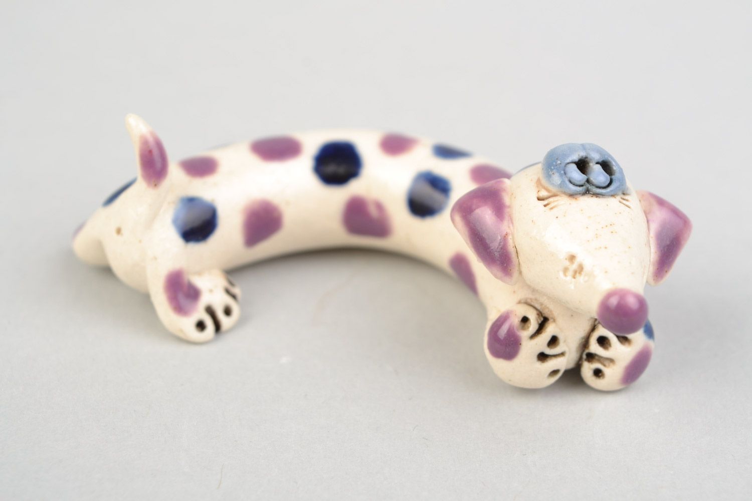Clay handmade figurine dachshund dog colored with glaze painted with spots photo 1