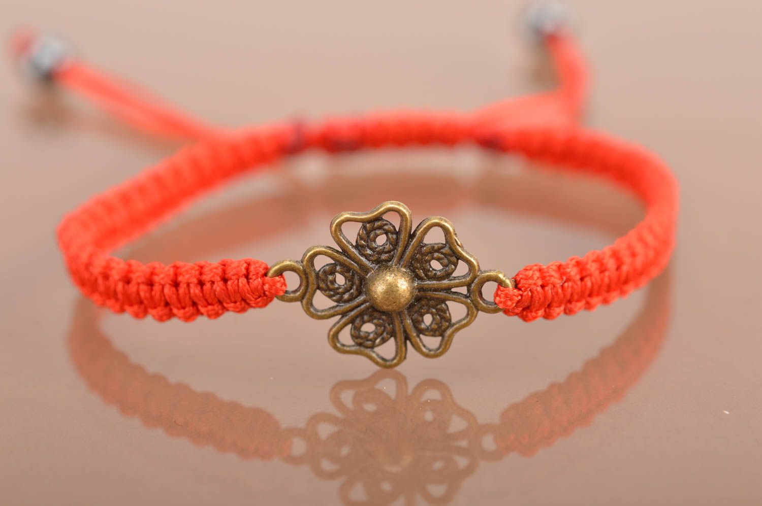 Handmade cute red bracelet made of silk threads on strings for every day photo 2