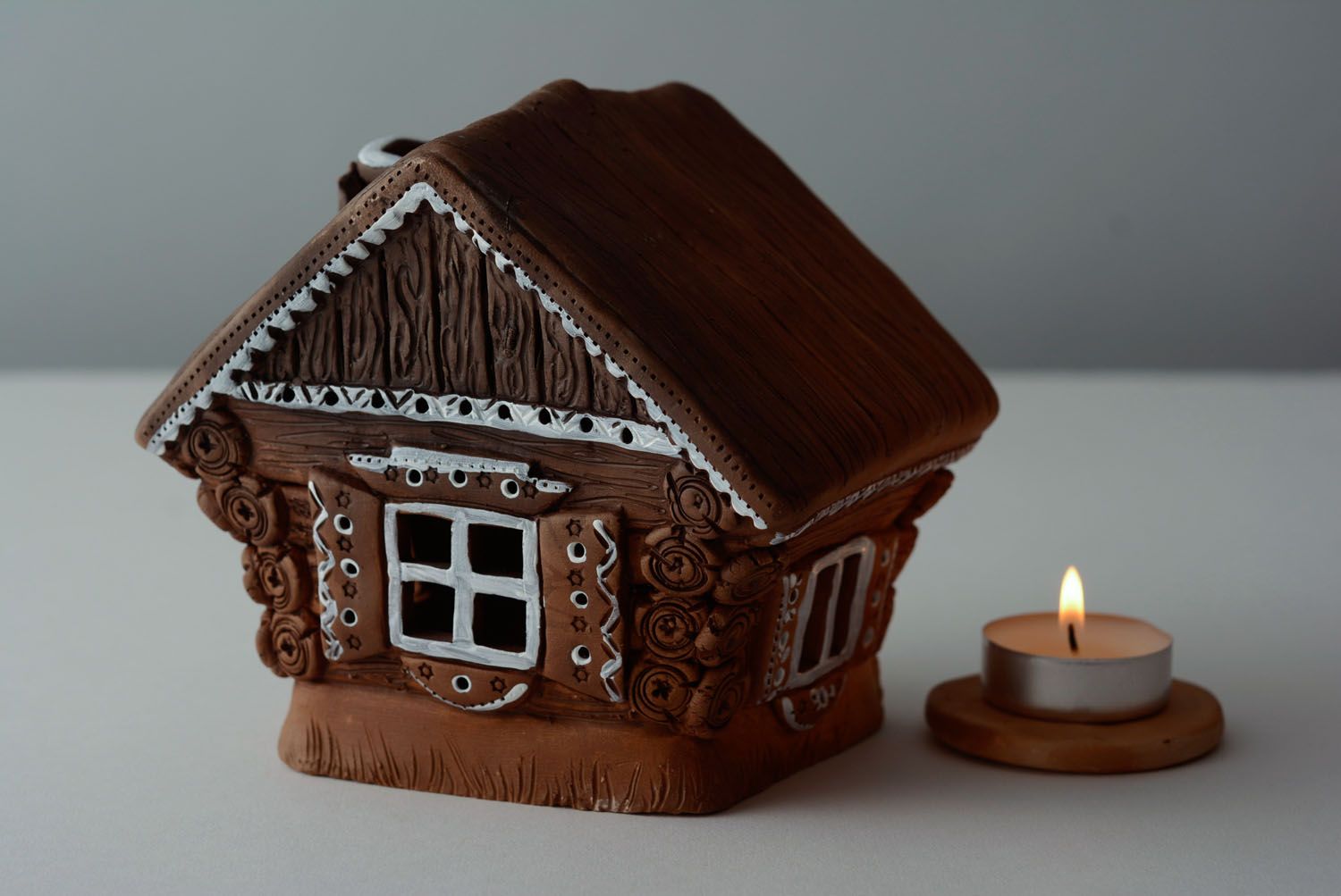 Ceramic candle holder in the shape of house photo 1