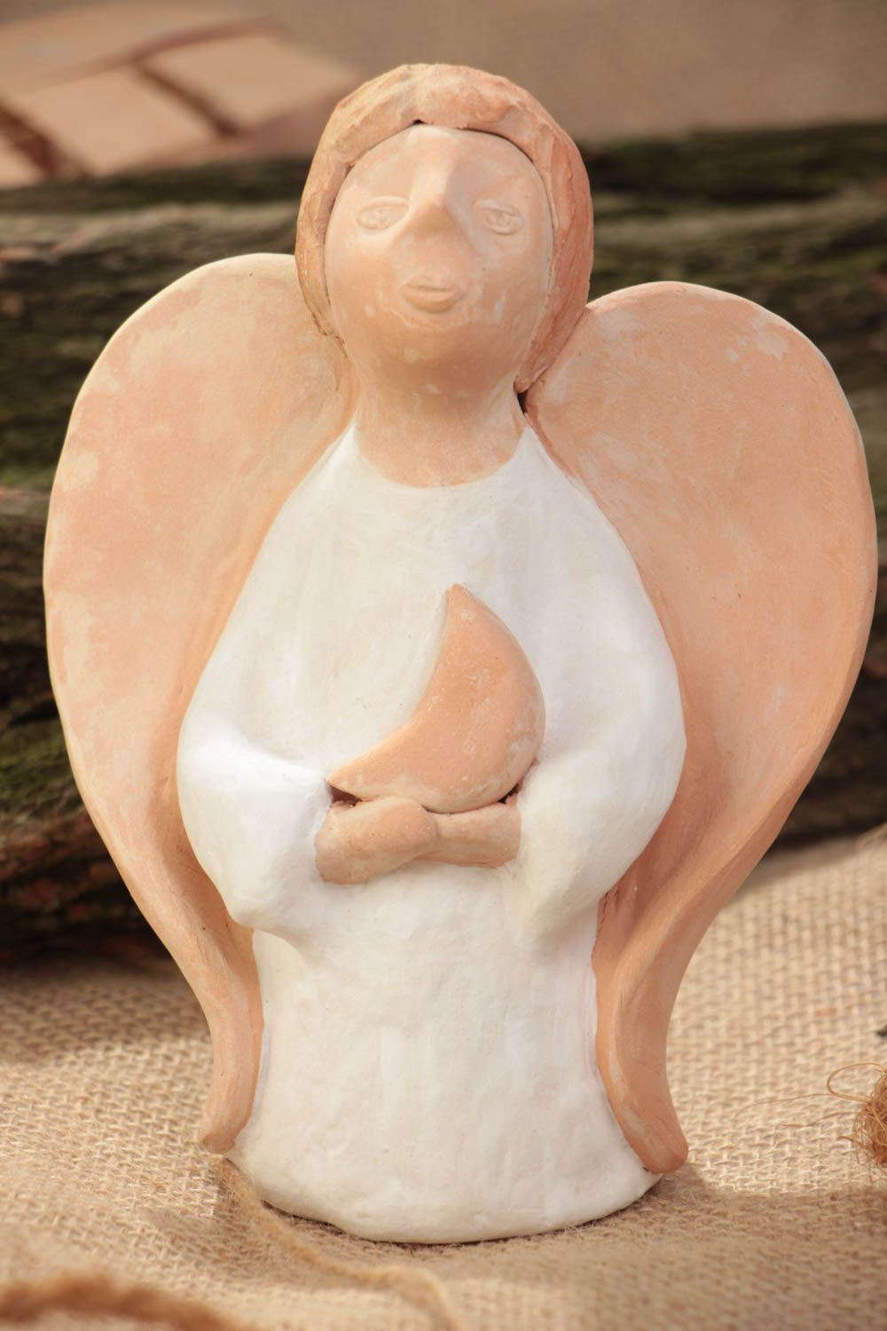 Clay figurine of angel with crescent in light shades small  handmade statuette photo 1