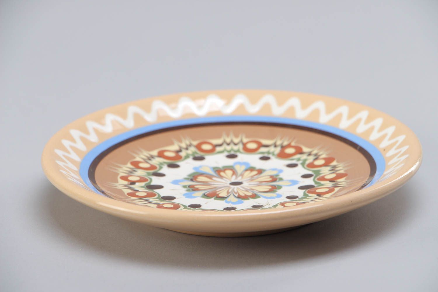 Small handmade clay saucer with beautiful color painting in ethnic style photo 2