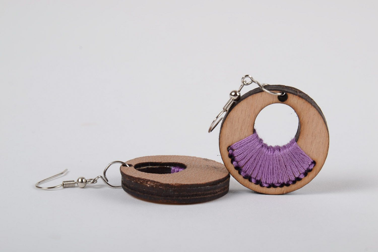 Handmade round shaped plywood earrings with purple embroidery   photo 4