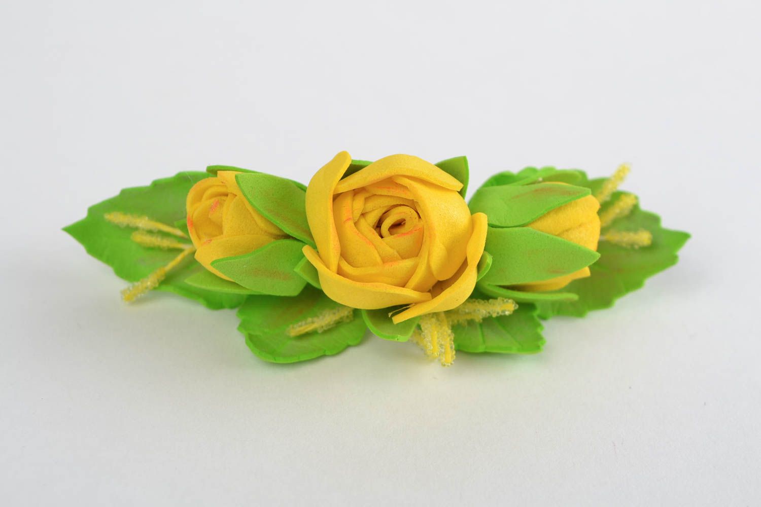 Handmade decorative hairpin made of foamiran with yellow roses  photo 1